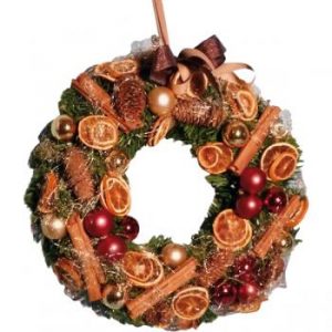 Couronne de porte de Noël aux agrumes et épices – Esprit traditionnel et chaleureux